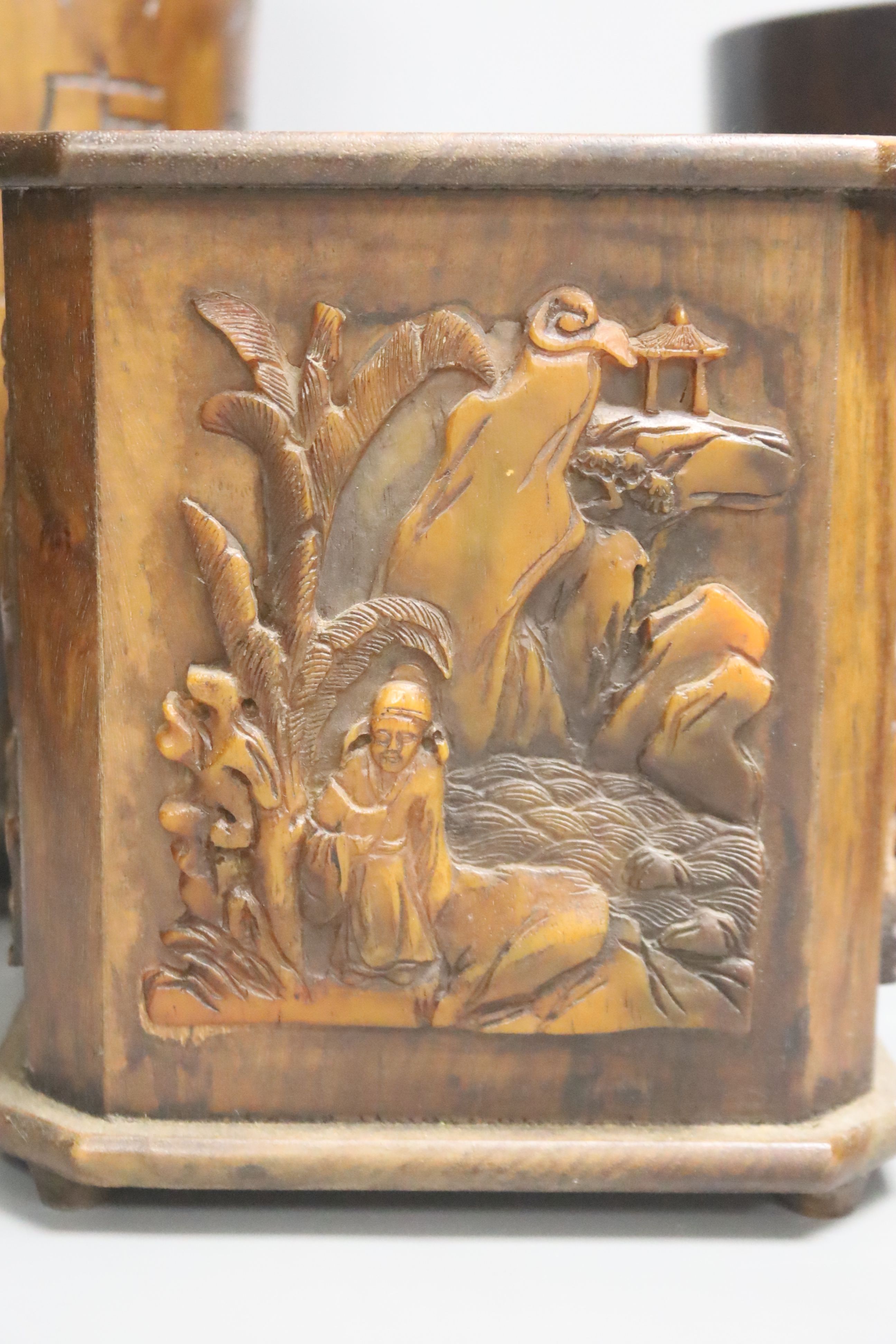 A large Chinese cylindrical wood box inlaid with mother of pearl and three Bitong / brush pots, tallest 31cm, the largest inlaid with mother of pearl, 20cm diameter